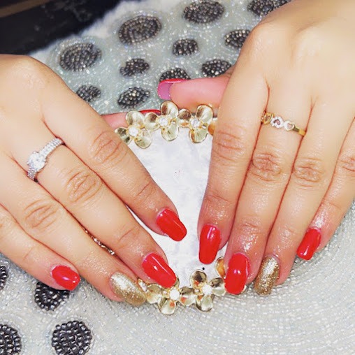 Vibrant Hot Pink Sharp Nails with Abstract Black Linework Art